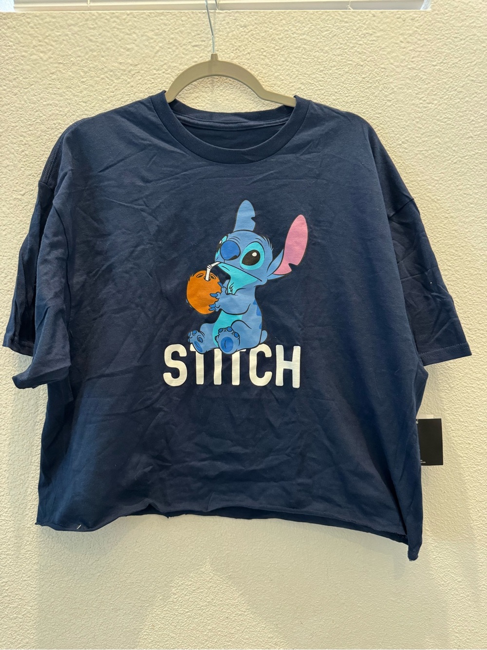 NWT Disney Lilo & Stitch navy blue graphic tee with a front print of Stitch